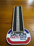 Datsun 410, 411 Radio Blank Plate Badge Used