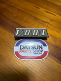 Datsun Cherry 100A Badge Used 84823-M0903 Nissan.