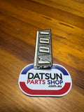 Datsun Cherry 100A Badge Used 84823-M0903 Nissan.