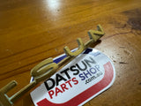 Datsun 411 Badge Used