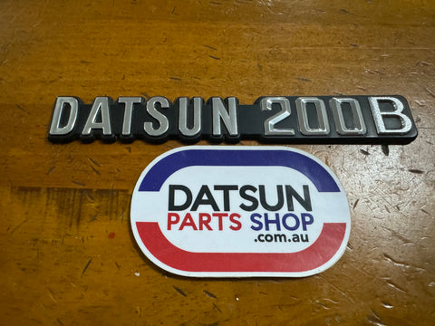 Datsun 200B Boot Badge Genuine Nos 810