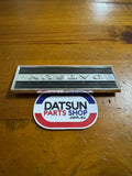 Datsun 410, 411 Radio Blank Plate Badge Used