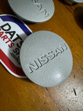 Nissan TRX 910 Bluebird Centre Caps x4 Used Datsun