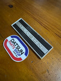 Datsun 410, 411 Radio Blank Plate Badge Used