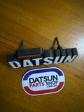 Datsun 180B Grill Badge Used 610