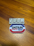 Datsun Cherry 100A Badge Used 84823-M0903 Nissan.