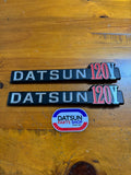 Datsun 120Y Coupe Side Badge Pair Nos Genuine Vb210