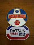 Nissan Diesel Pressed Tin Plaque Badge