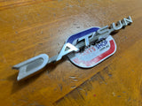 Datsun Badge Used