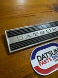 Datsun 410, 411 Radio Blank Plate Badge Used