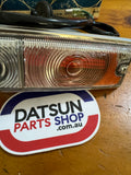 Datsun 1000 Front Combo Lamp NOS