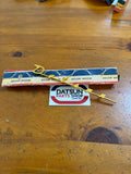 Datsun Bluebird Rear Badge Emblem 410 411 NOS Genuine