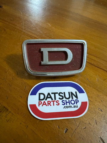 Datsun 1000 Grill Badge Used