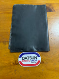 Datsun Owners Manual Folder Used Nissan (small rip)