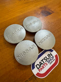 Nissan TRX 910 Bluebird Centre Caps x4 Used Datsun