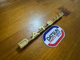 Datsun 411 Badge Used