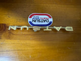 Datsun 411 Badge Used