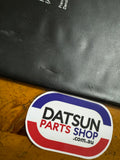 Datsun Owners Manual Folder Used Nissan (small rip)