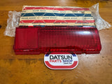 Datsun 1000 B10 LH Tail Light Lens NOS Late Model