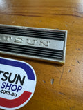 Datsun 410, 411 Radio Blank Plate Badge Used