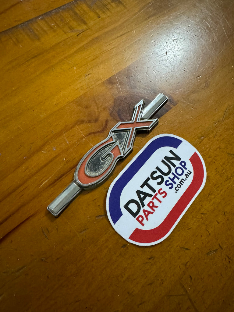 Datsun 200B 810 GX Badge Used Datsun Parts Shop