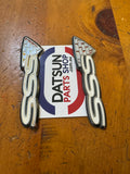 Datsun 200B SSS Badge Pair Used