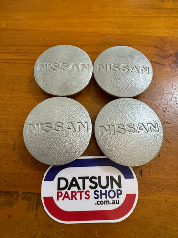 Nissan TRX 910 Bluebird Centre Caps x4 Used Datsun