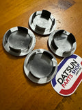 Datsun TRX 910 Bluebird Centre Caps x4 Used Datsun