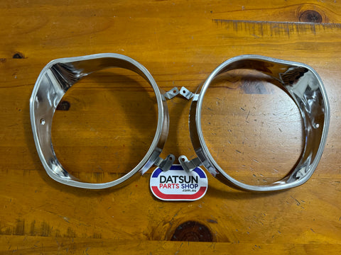 Datsun 1200 Head Light Surround Pair NOS