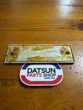 Datsun 410, 411 Radio Blank Plate Badge Used