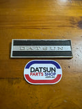 Datsun 410, 411 Radio Blank Plate Badge Used