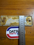 Datsun 410, 411 Radio Blank Plate Badge Used