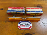 Datsun 1000 Side Lamp Lens & Bezel Pair NOS