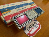 Datsun 1000 Coupe KB10 Grill Badge NOS