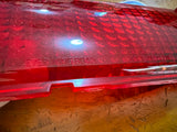 Datsun 1000 B10 LH Tail Light Lens NOS Late Model