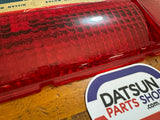 Datsun 1000 B10 LH Tail Light Lens NOS Late Model