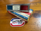 Datsun 1000 Coupe KB10 Grill Badge NOS