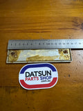 Datsun 410, 411 Radio Blank Plate Badge Used