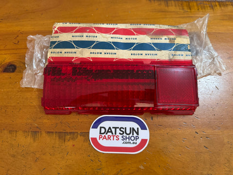 Datsun 1000 B10 LH Tail Light Lens NOS Late Model