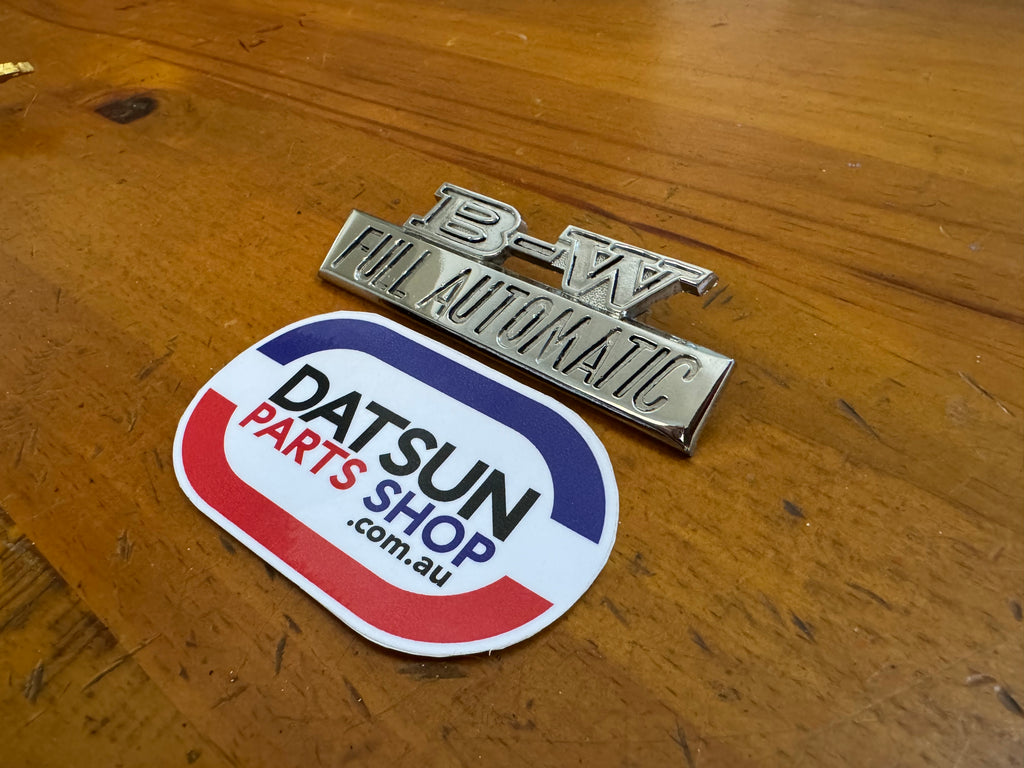 Datsun B-W Full Automatic Badge Used – Datsun Parts Shop