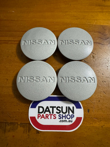 Nissan TRX 910 Bluebird Centre Caps x4 Used Datsun