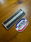 Datsun 410, 411 Radio Blank Plate Badge Used