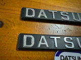 Datsun 120Y Coupe Side Badge Pair Nos Genuine Vb210