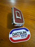 Datsun 1000 Grill Badge Used