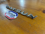 Datsun Badge Used