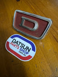 Datsun 1000 Grill Badge Used