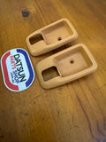 Datsun B310 Sunny Tan Escutcheon Pair Used