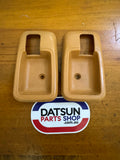 Datsun B310 Sunny Tan Escutcheon Pair Used