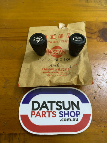 Datsun 180B Head Light & Wiper Knob Pair NOS 610