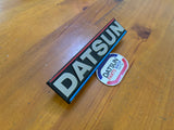 Datsun Grill Badge Suit Patrol 160 Nos Genuine Nissan